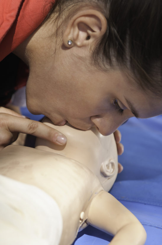 adult training with baby dummy cpr